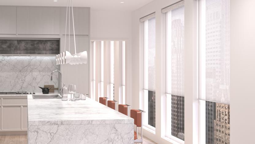 Motorised Lutron shades softening daylight in a contemporary kitchen